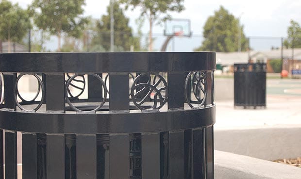 Atlanta litter receptacle with basketball themed laser cuts