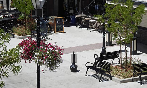 Schenley benches arranged for outdoor seating in a pedestrian zone
