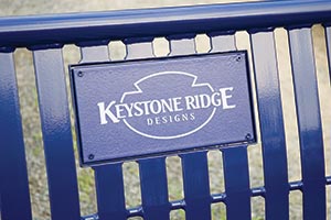 Decal of Keystone Ridge Designs' logo on bench back