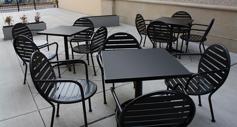 Olivia Table Sets in an outdoor restaurant seating space
