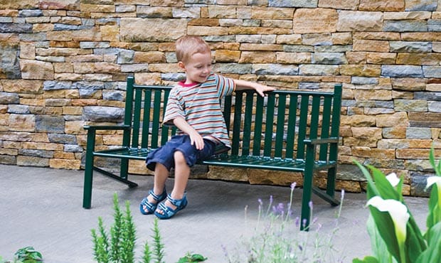 Child on Children's Thendara bench