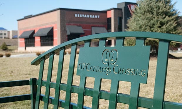 McConnell bench with laser cut logo closeup at McCandless Crossing
