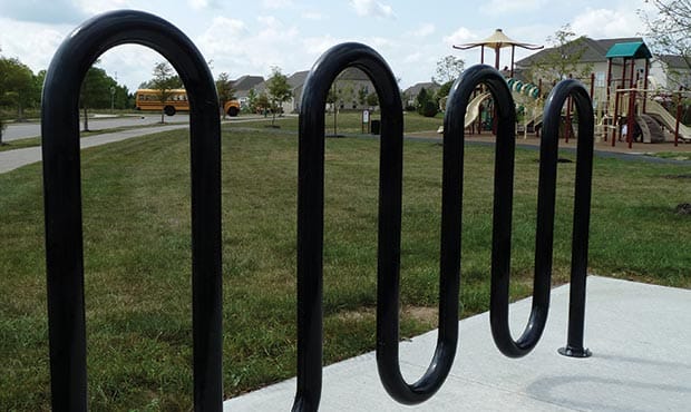 Sonance bike rack at a playground