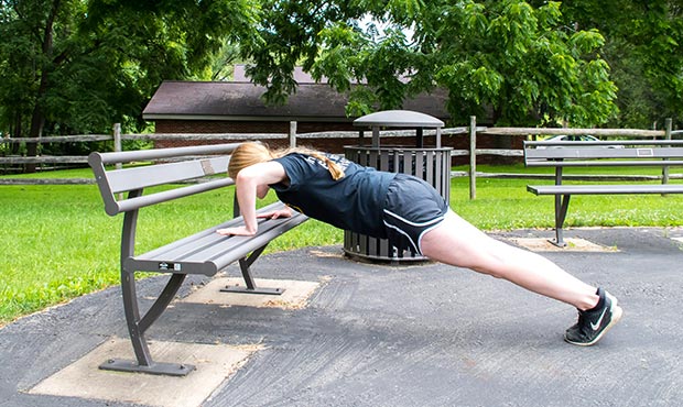 Pushup exercuse on a Penn Bench