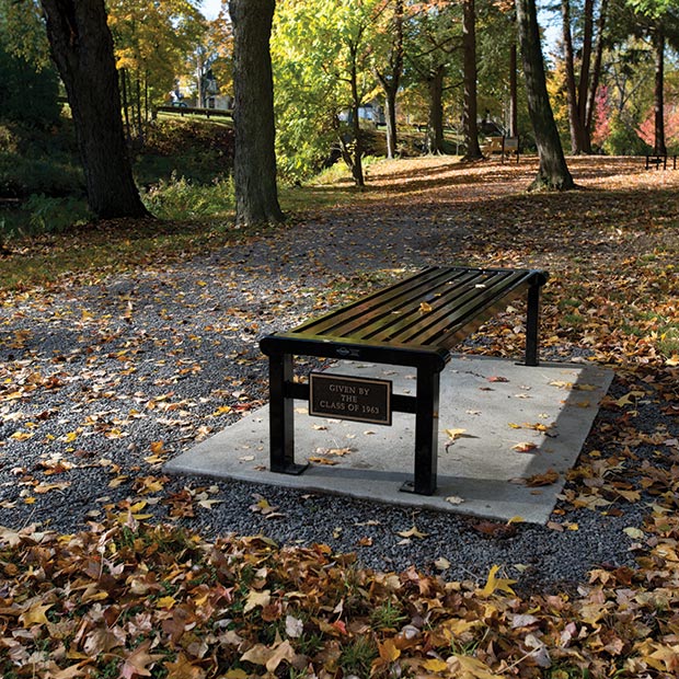 Flat Reading bench with cast bronze plaque underneath