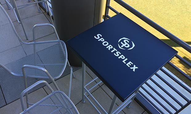 Mecklenburg sports complex logo on a Weston table top