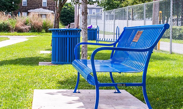 Pullman Bench with plaque in a community park