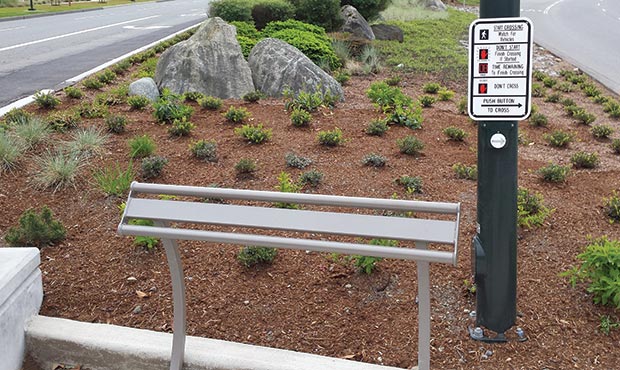 Penn Leaning Rail installed at a crosswalk