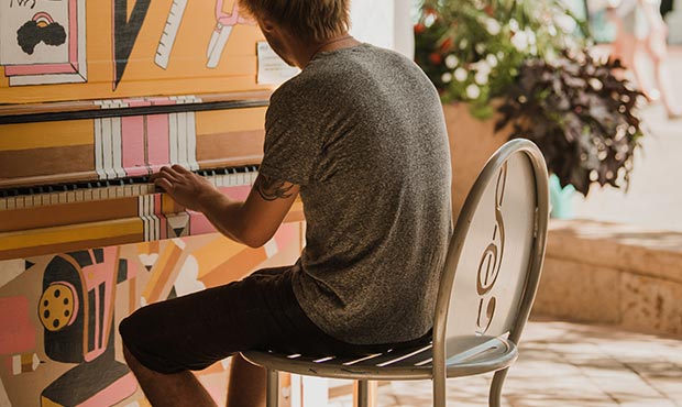 A pause in the day to enjoy some music on an Olivia Chair