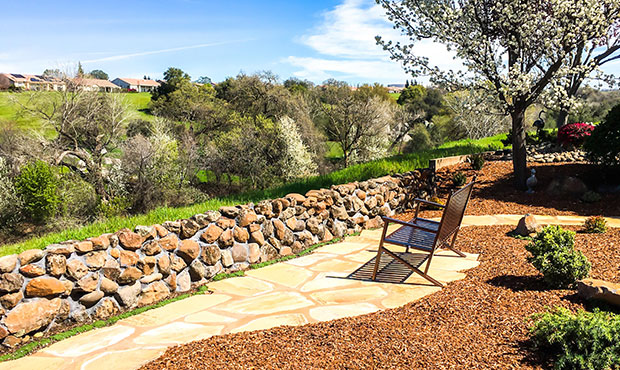 A Thendara Bench overlooking a scenic backdrop