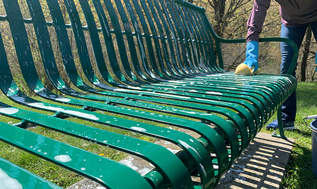 Cleaning a powder coated steel bench involves simple soap and water