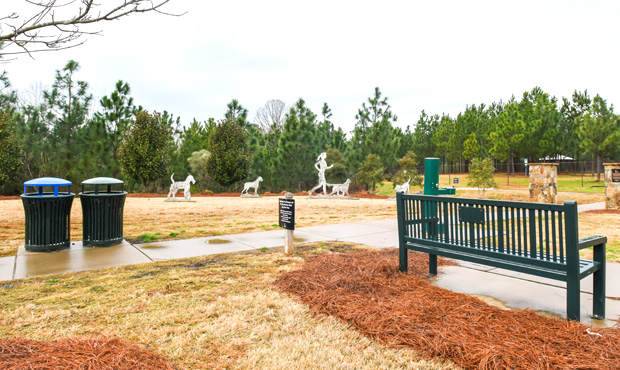 Picture of Keystone Ridge Reading Green Bench and Related Trash Cans