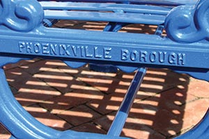Blue Lamplighter bench nameplate closeup