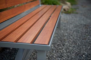 Wood Grain Aluminum Slats on Breakwater Bench with Back