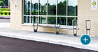 Creekview Flat Bench and Bike Racks outside a local hospital