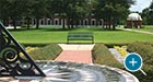 Pullman Bench with a plaque on a college campus