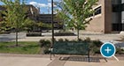 Pullman Bench with Back that features a commemorative cast bronze plaque