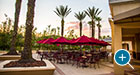 Courtyard Table Sets sit on an outdoor patio for optimal sunset viewing