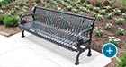 Lamplighter Bench with Back in a scenic landscaped garden