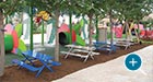 Children's Breakwater Picnic Tables in a playground setting