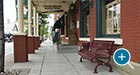 Commemorative Lamplighter Bench with Back and cast bronze plaque in Zelienople, PA