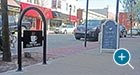 Customizated laser cut Sonance Bike Rack on a main street