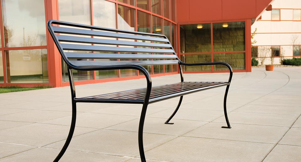 Sienna Bench with Back outside a school building