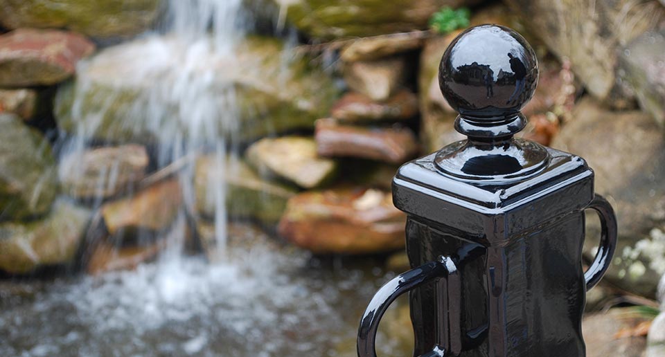 Bellevue Bollard set against a water feature backdrop